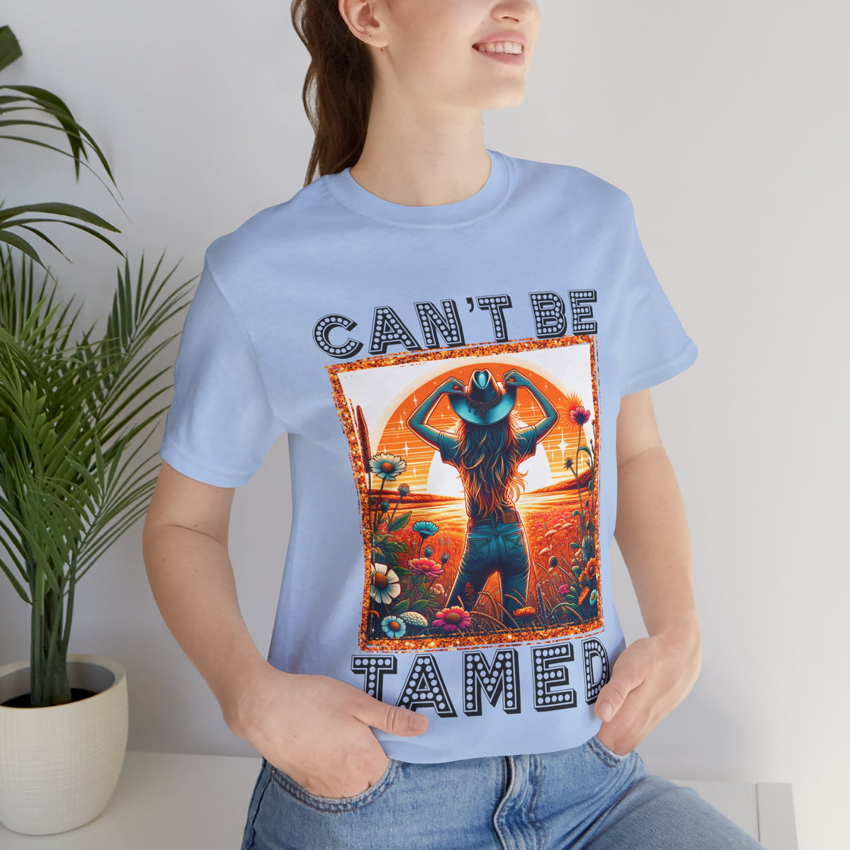 Can’t Be Tamed Women’s Graphic T-Shirt