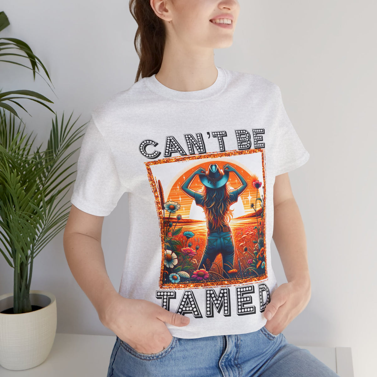 Can’t Be Tamed Women’s Graphic T-Shirt