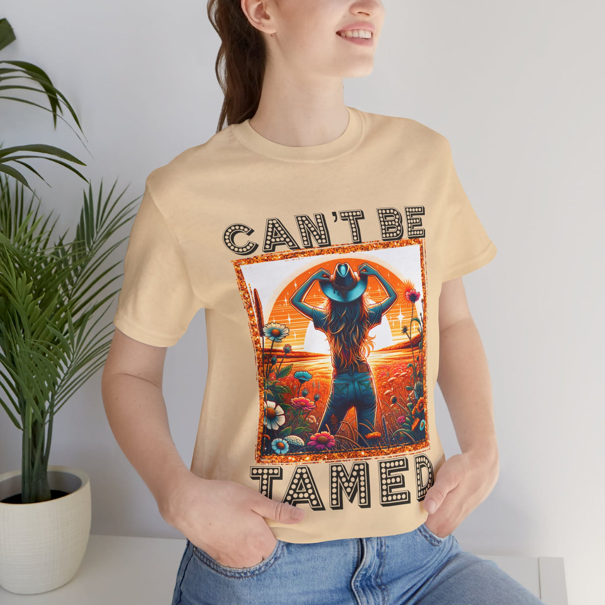 Can’t Be Tamed Women’s Graphic T-Shirt